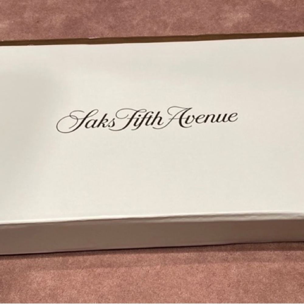 Gently used elegant white gift box from SAX FIFTH AVENUE.
